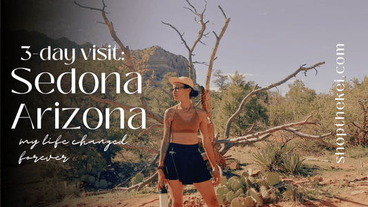 Blog Cover. Kaira power stance in front of a striking petrified tree at the base of Bell Rock in Sedona Arizona. My sister wears a sun bathed orange cap, earthy sports bra, and black yoga skort with sneakers.
