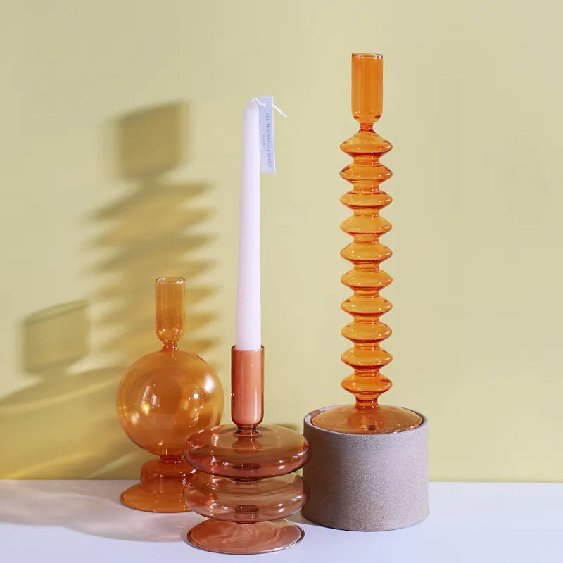 Roma Glass candlestick holders by Shop the Kei home treasure collection in various clear orange shapes. Handmade modern-style colored glass candlestick holder, tall and elegant, perfect for home décor. Available in multiple unique designs