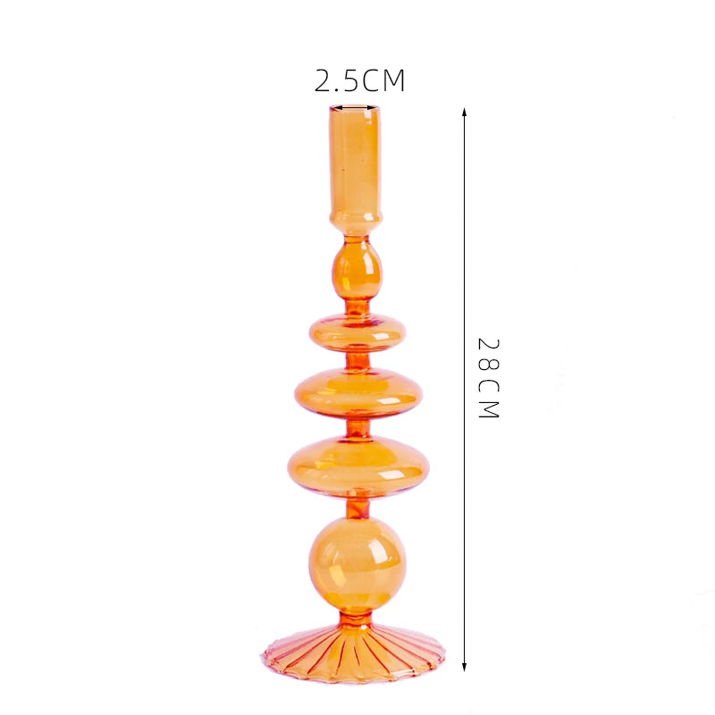 Roma Glass candlestick holder by Shop the Kei home treasure collection in clear orange. Roma Glass candlestick holder by Shop the Kei home treasure collection in clear orange. Stacked 1-drop, 1-saucer, 2-disk, bubble with scalloped slope base modern-style blown glass candlestick holder dimensions 2.5cm X 28cm X 9cm