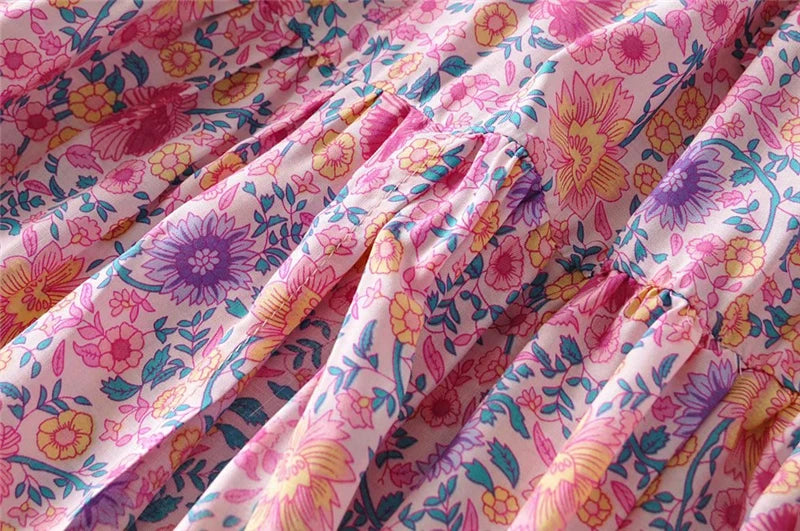 Amelie Boho Maxi Skirt from Shop The Kei - closeup detail of pink, yellow, and purple floral print pattern, and natural fiber textile texture.