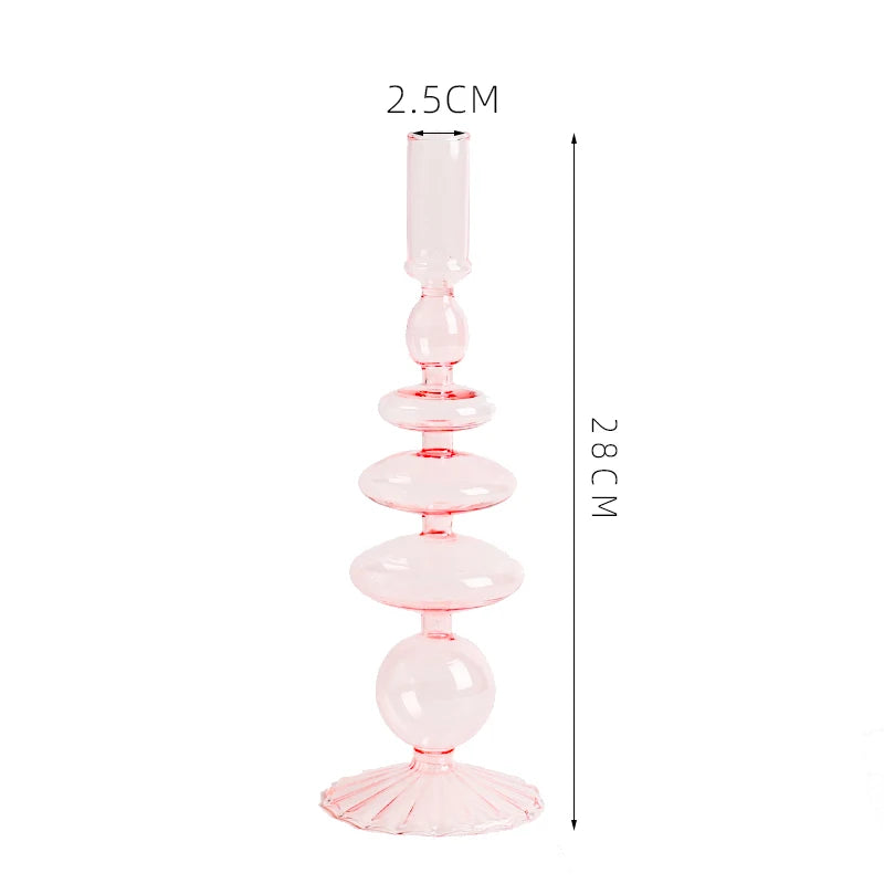 Roma Glass candlestick holder by Shop the Kei home treasure collection in clear pink. Roma Glass candlestick holder by Shop the Kei home treasure collection in clear pink. Stacked 1-drop, 1-saucer, 2-disk, bubble with scalloped slope base modern-style blown glass candlestick holder dimensions 2.5cm X 28cm X 9cm