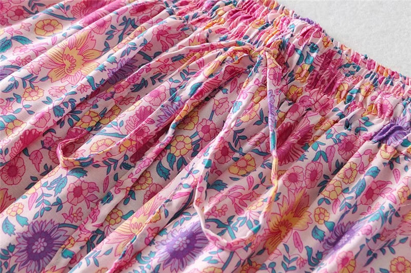 Amelie Boho Maxi Skirt from Shop The Kei - closeup detail of stretch waistband, waist tie, floral print pattern, and natural fiber textile texture