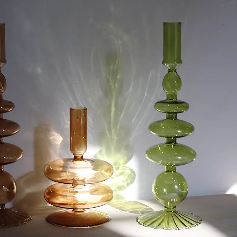 Roma Glass candlestick holders by Shop the Kei home treasure collection in various clear brown and green shapes. Handmade modern-style colored glass candlestick holder, tall and elegant, perfect for home décor. Available in multiple unique designs