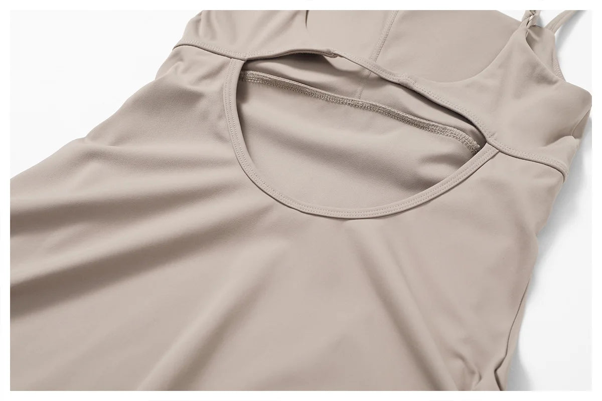 Close view of the Bree Yoga Dress in dark linen color. Highlights he back topstitching and neckline construction