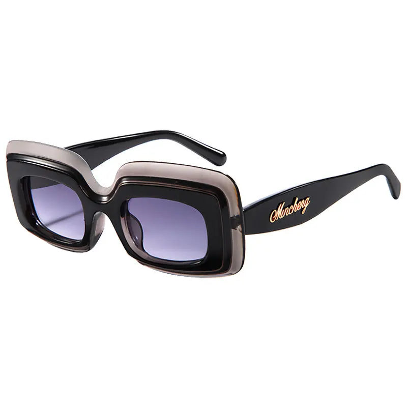 Onyx Retro Shades sunglasses, a black and gray frame with dark gradient lenses, shown at a three-quarter angle on a white background.