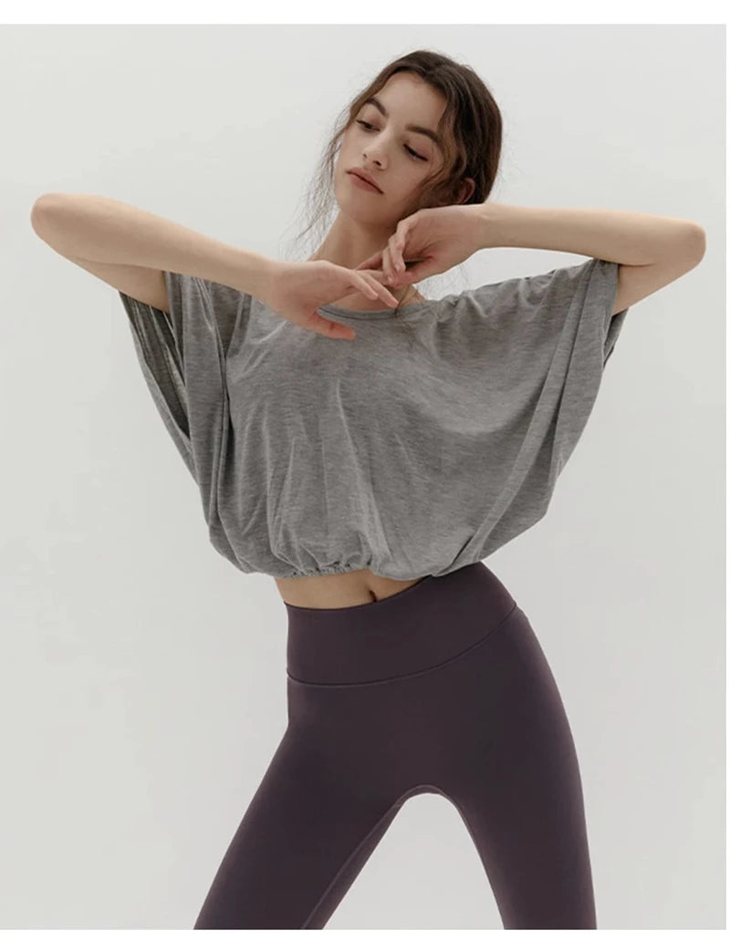 Veda Butterfly Top from Shop the Kei - is available in a gray matter color option that looks casual and denim friendly