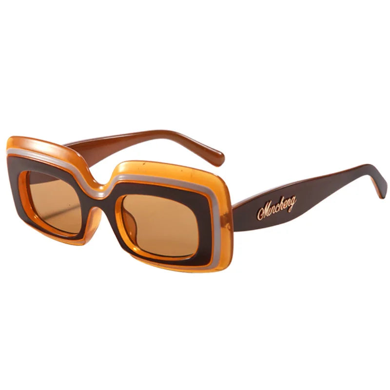 Amber Retro Shades sunglasses, a brown and tan tri-tone frame with amber gradient lenses, shown at a three-quarter angle on a white background.