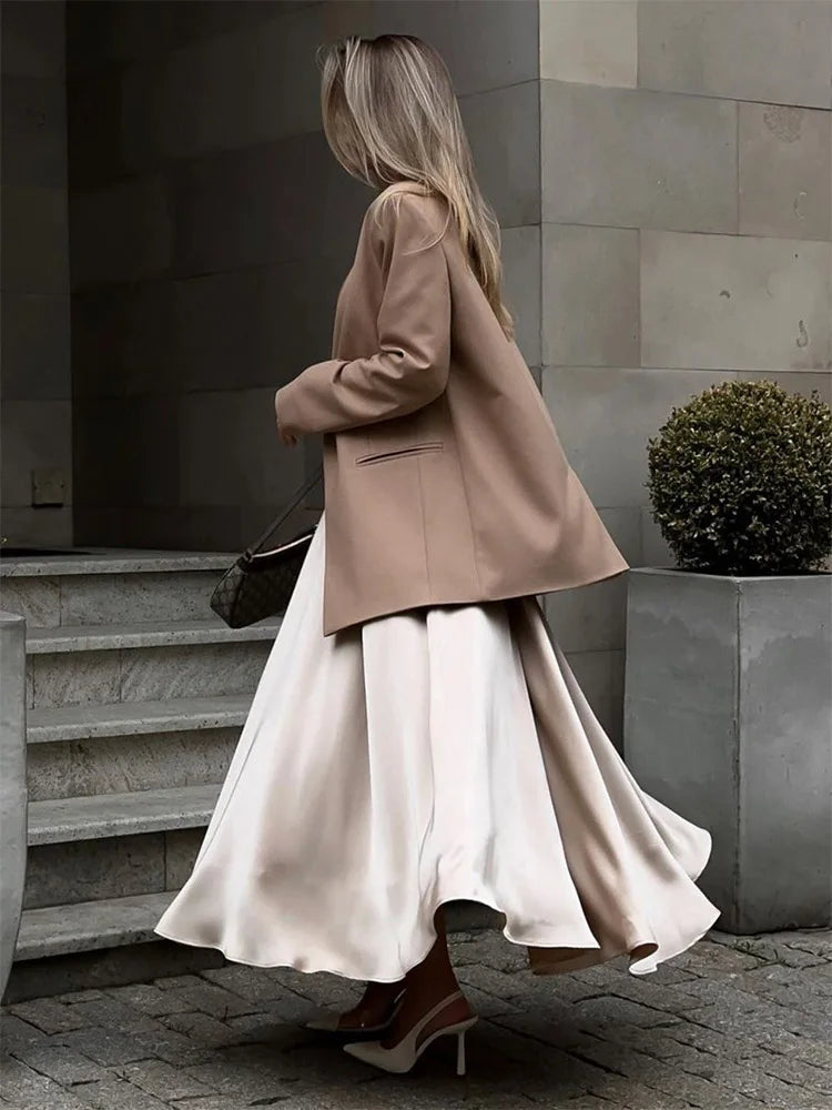 Amber Satin Maxi Skirt from Shop the Kei - flowing satin maxi skirt with high waist and flare hem. Flows and flares beautifully when worn.