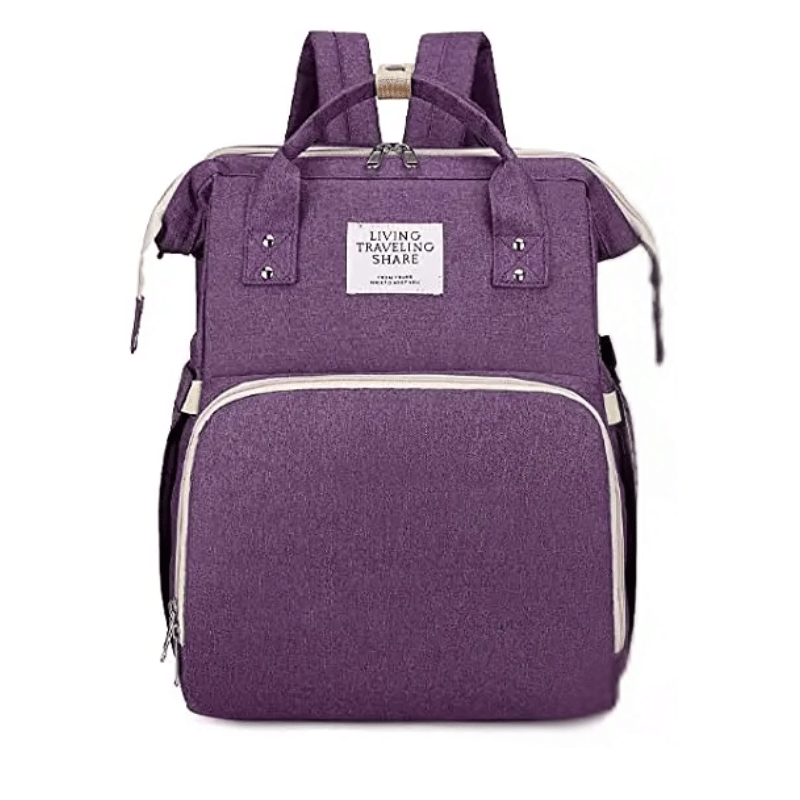 Purple Lotus 3-in-1 Bassinet Diaper Bag with cream trim zippers, wide backpack straps, and multiple compartments for baby essentials. Partial canopy available