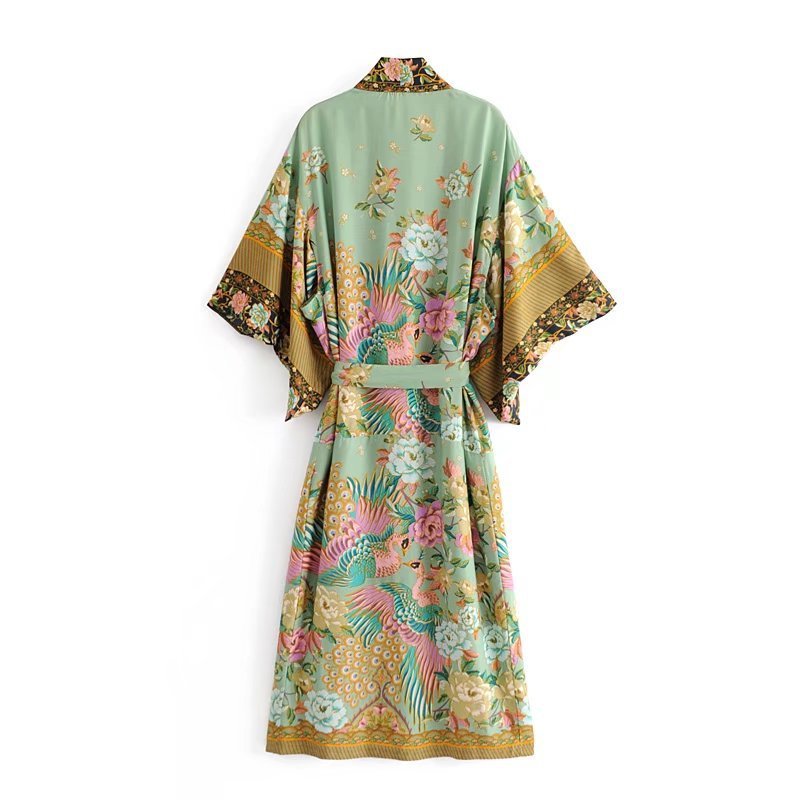 Back view of Nyma Kimono from Shop The Kei swim collection. Garment is hanging flat on a white background