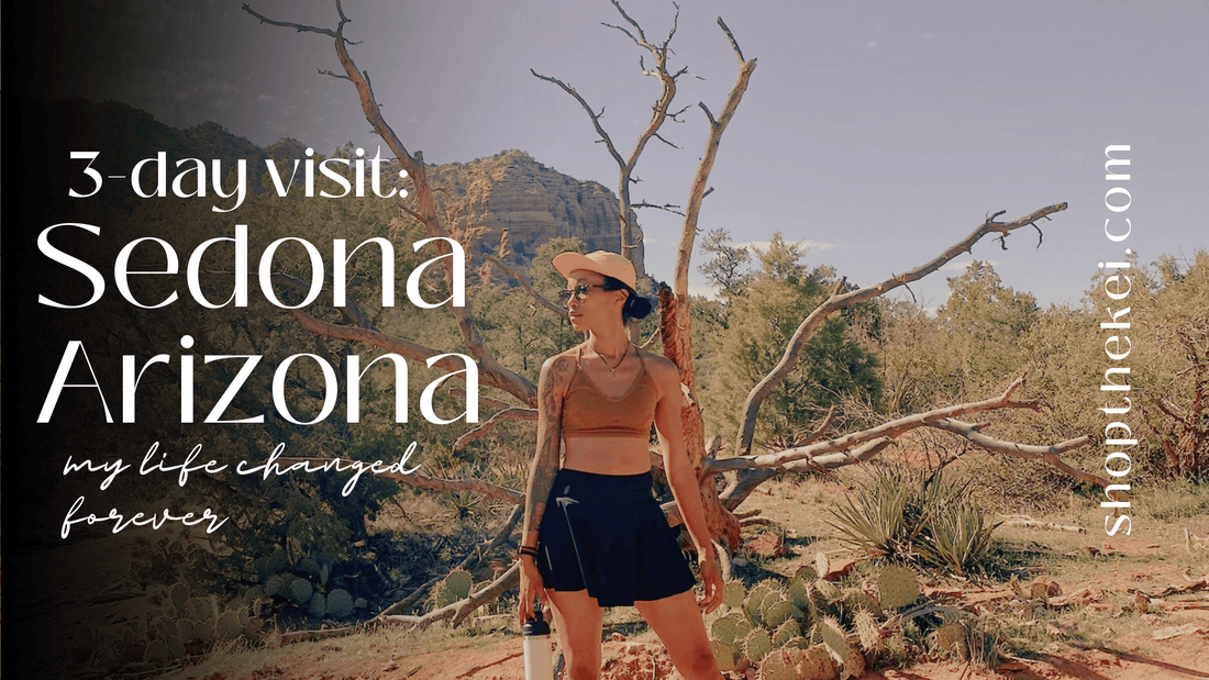 Blog Cover. Kaira power stance in front of a striking petrified tree at the base of Bell Rock in Sedona Arizona. My sister wears a sun bathed orange cap, earthy sports bra, and black yoga skort with sneakers.