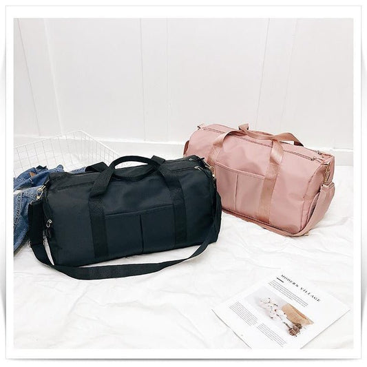Shop the Kei Carry On Travel Bag, packed and ready for a capsule wardrobe trip
