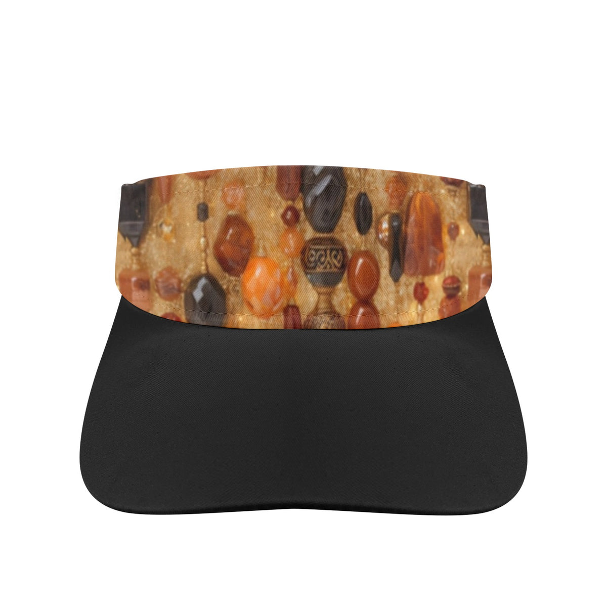 A black visor with a wide, decorative printed headband featuring a gold background and colorful gemstone motifs, shown against a plain white background.