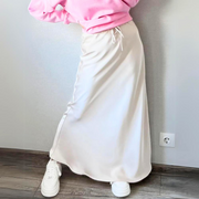 Bela Satin Maxi Skirt from Shop the Kei - flowing satin maxi skirt with drawstring waist and flare hem. Wear casually with an athletic top and sneakers