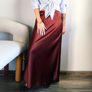 Bela Satin Maxi Skirt from Shop the Kei - flowing satin maxi skirt with drawstring waist and flare hem. Pairs well with neutral colors. Completes a professional look with a collared skirt