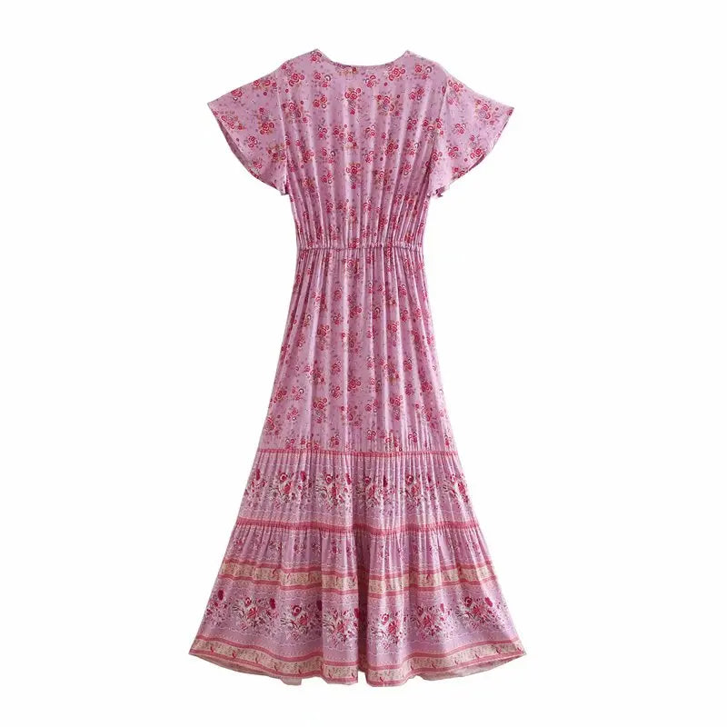 Birdie Summer Midi Dress from Shop the Kei - back view of a pink color option flower print bohemian styled dress on white background