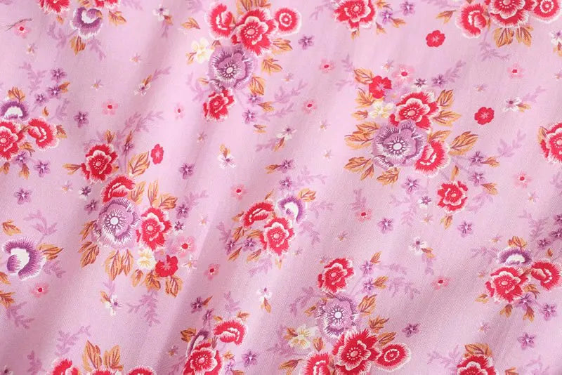 Birdie Summer Midi Dress from Shop the Kei - close up of pink purple flower print pinks and oranges and soft natural textile