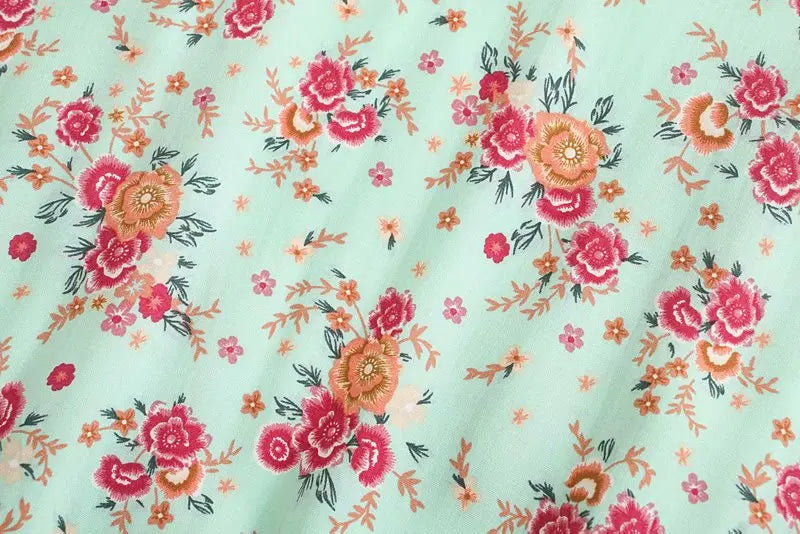 Birdie Summer Midi Dress from Shop the Kei - close up of mint flower print pinks and oranges and soft natural textile