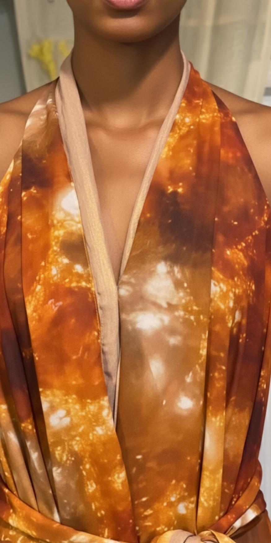 Close-up of a person wearing a patterned garment with a blurred background