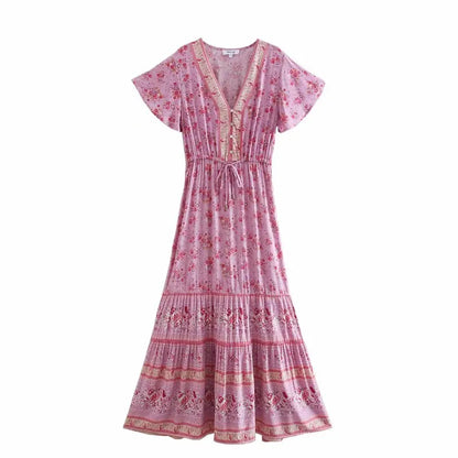 Birdie Summer Midi Dress from Shop the Kei - front view of a pink color option flower print bohemian styled dress on white background