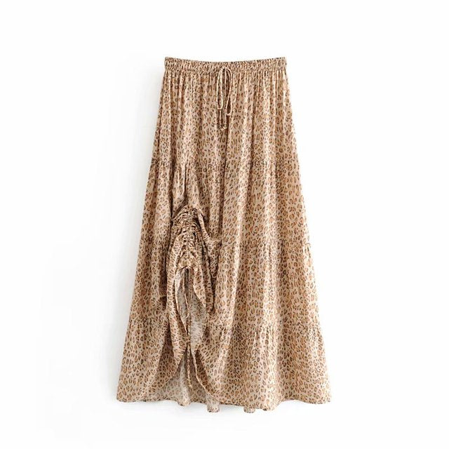 Nirabi Leopard Maxi Skirt from Shop the Kei - animal print maxi skirt with elastic waistband and asymmetric hem displayed on plain white background.