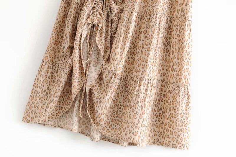 Nirabi Leopard Maxi Skirt from Shop the Kei - close up- tan animal print, drawstring  drapery, ruffle asymmetric hemline and natural fiber textile texture