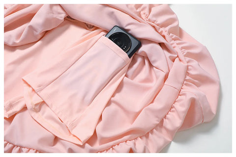 Close up of the Rinay Sport Dress. Image shows a side pocket on the attached shorts inside