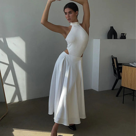 Amber Satin Maxi Skirt from Shop the Kei - flowing ivory white satin maxi skirt with high waist and flare hem. Pairs well with matching body suit turtleneck. Dancer style long circle skirt