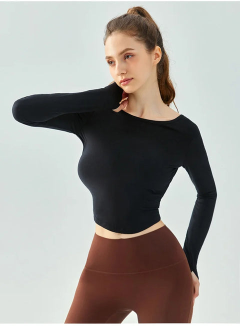 Eden Seamless Cross Back Top from Shop the Kei - side view of athletic apparel soft and breathable long sleeve top. Dancer inspired style pairs well with yoga pants