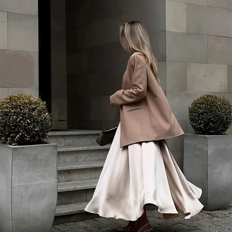 Amber Satin Maxi Skirt from Shop the Kei - flowing satin maxi skirt with high waist and flare hem. Flows and flares beautifully when worn.