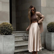 Amber Satin Maxi Skirt from Shop the Kei - flowing satin maxi skirt with high waist and flare hem. Pairs well with neutral colors. Old money luxury style long skirt.