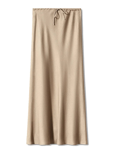 Bela Satin Maxi Skirt from Shop the Kei - a soft ivory champagne color option