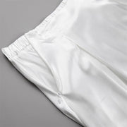 Amber Satin Maxi Skirt from Shop the Kei - close up of side zipper closure, front pleats, backstretch waistband, lining, and satin textile texture