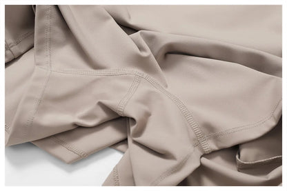 Close view of the Bree Yoga Dress in dark linen color. Highlights the flat seam construction