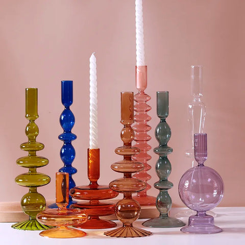 Roma Glass candlestick holders by Shop the Kei home treasure collection in various clear colors; green, blue, purple, and pink. Handmade modern-style colored glass candlestick holder, tall and elegant, perfect for home décor. Available in multiple unique designs