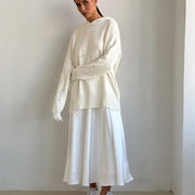 Amber Satin Maxi Skirt from Shop the Kei - flowing ivory white satin maxi skirt with high waist and flare hem. Pairs well with distressed styled sweaters. Casual Off White grunge look