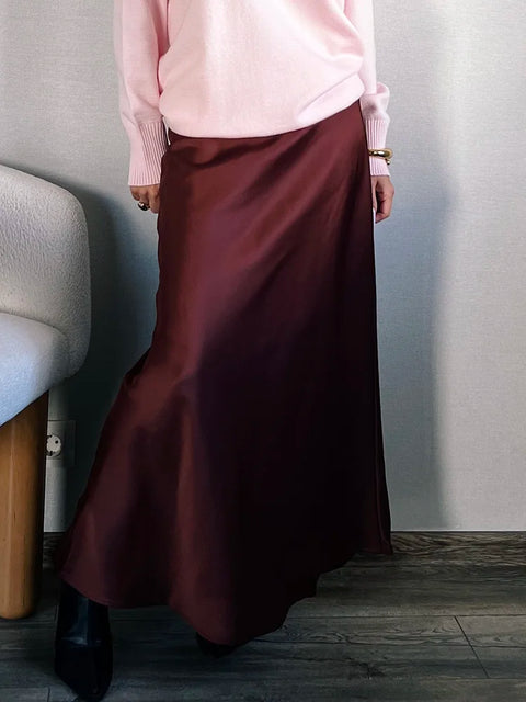 Bela Satin Maxi Skirt from Shop the Kei - flowing satin maxi skirt with drawstring waist and flare hem. Pairs well with a pretty sweater