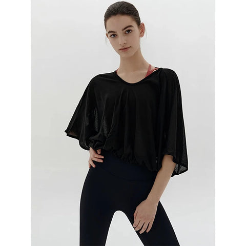 Veda Butterfly Top from Shop the Kei -  is available in a classic black color option that looks elegant and slightly translucent