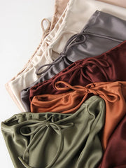 Bela Satin Maxi Skirt from Shop the Kei - waist view - available in rich earth tones: ivory, white, gray, dark red, orange, and green