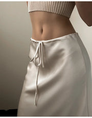 Bela Satin Maxi Skirt from Shop the Kei - close up of drawstring waistband, bias fitting, and satin textile texture