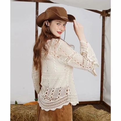 Juno Crochet Top from Shop the Kei - side view of the loose fitting crochet lace top with long sleeves and pretty scalloped edges.