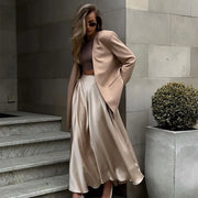 Amber Satin Maxi Skirt from Shop the Kei - flowing satin maxi skirt with high waist and flare hem. Pairs well with neutral colors. Romantic date night skirt.