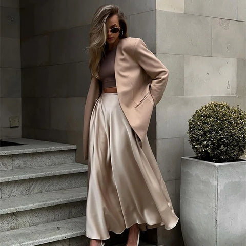 Amber Satin Maxi Skirt from Shop the Kei - flowing satin maxi skirt with high waist and flare hem. Pairs well with neutral colors. Romantic date night skirt.