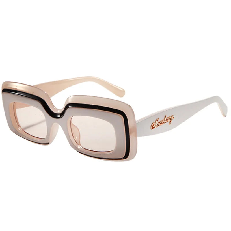 Champagne Retro Shades sunglasses, a cream frame with black trim and light amber-tinted lenses, shown at a three-quarter angle on a white background.