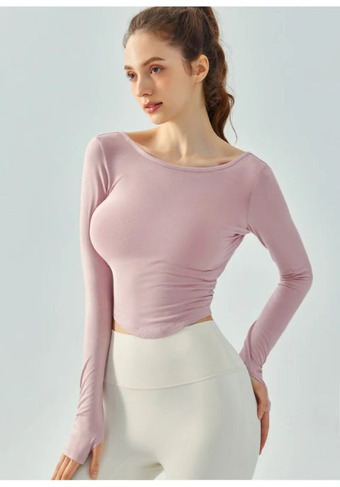 Eden Seamless Cross Back Top from Shop the Kei - front view of athletic apparel soft and breathable long sleeve top. Dancer inspired style pairs well with yoga pants