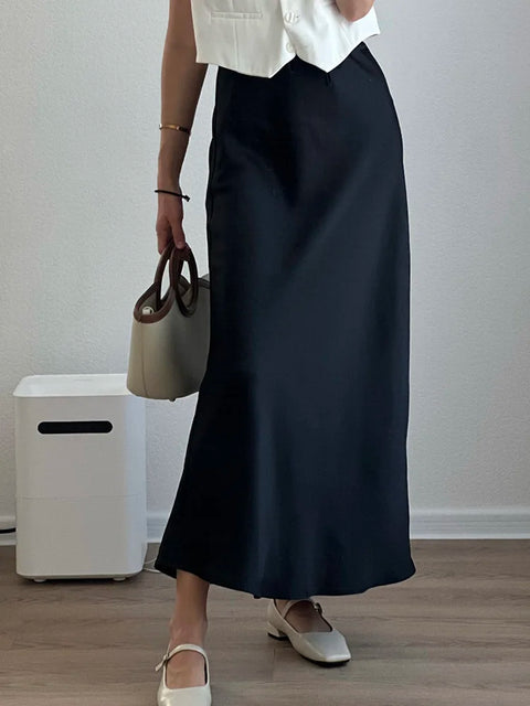 Bela Satin Maxi Skirt from Shop the Kei - black bias fitting skirt. Pairs well with a white top and flats