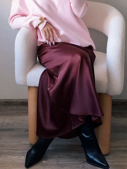 Bela Satin Maxi Skirt from Shop the Kei - flowing satin maxi skirt with drawstring waist and flare hem. Pairs well with a pretty sweater and boots