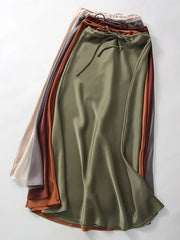 Bela Satin Maxi Skirt from Shop the Kei - full length view - available in rich earth tones: ivory, white, gray, dark red, orange, and green