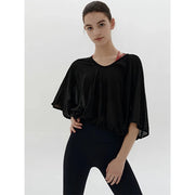 Veda Butterfly Top from Shop the Kei -  black color option loose fitting dancer inspired design that drapes elegantly over the shoulders. Elastic waist creates an accentuating shape.