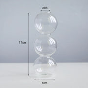 Roma Glass candlestick holder by Shop the Kei home treasure collection in clear. 3-stacked bubbles shape modern-style blown glass candlestick holder dimensions 2cm X 17cm X 6cm